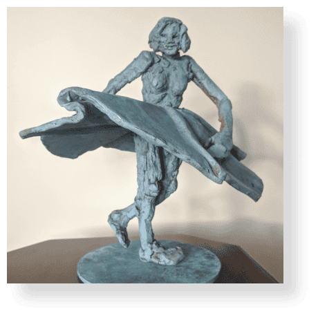 Vintage bronze sculpture of a young girl holding a surfboard, capturing a playful and energetic spirit, perfect for beach-themed decor or art collections.