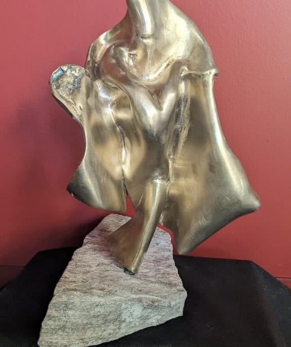 Elegant abstract bronze sculpture by Richard Comparey, showcasing modern art and contemporary design. Perfect for art collectors and interior decor enthusiasts.